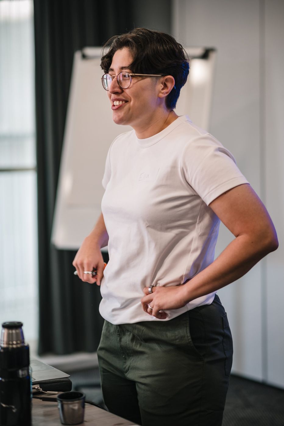 Dr Ella Whitcomb-Khan smiling while leading a workshop